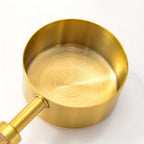 Golden Measuring  Spoon Set — material texture close-up