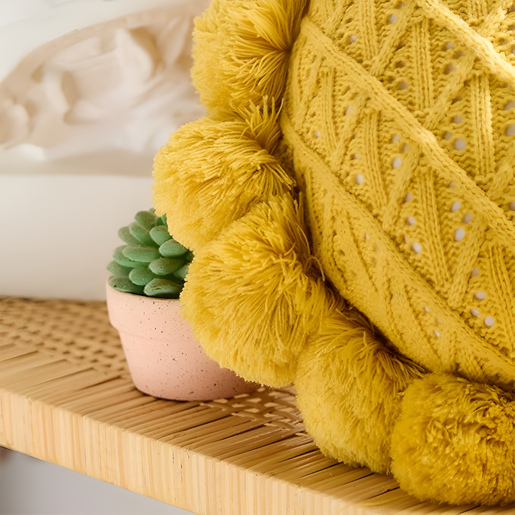 Chic Sunflower Pom-Pom Cushion — product in use