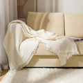 Waffle Weave Cotton Knitted Tassel Blanket — product in use