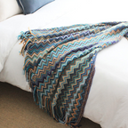 Multicolour Zigzag Tasseled Knit Throw — product in use