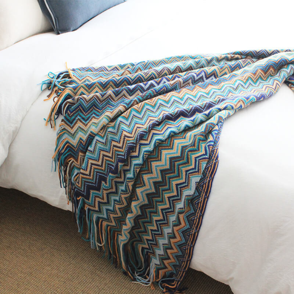 Multicolour Zigzag Tasseled Knit Throw — product in use