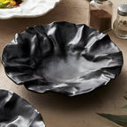 Artisan Wrinkled Paper Ceramic Plate — product in use