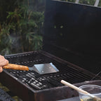 Stainless Grill Brush and Scraper — product in use