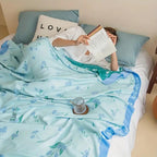 Blue Floral Bamboo Fibre Cooling Blanket — product in use