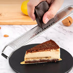 Sleek Multi-Use Long-Handled Grater — product in use