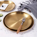 Lustrous Golden Stainless Steel Serving Plates — lifestyle shot