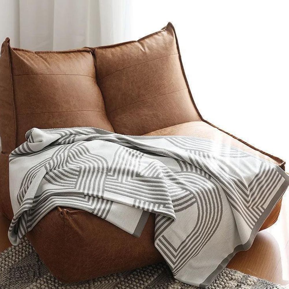 Snuggle Maze Knit Blanket — product in use