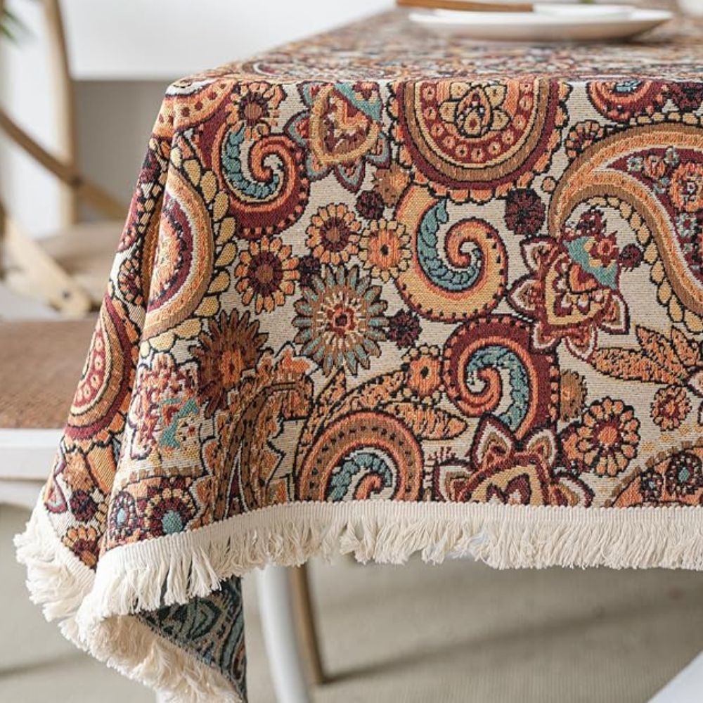 Amber Paisley Tassel Tablecloth — product in use