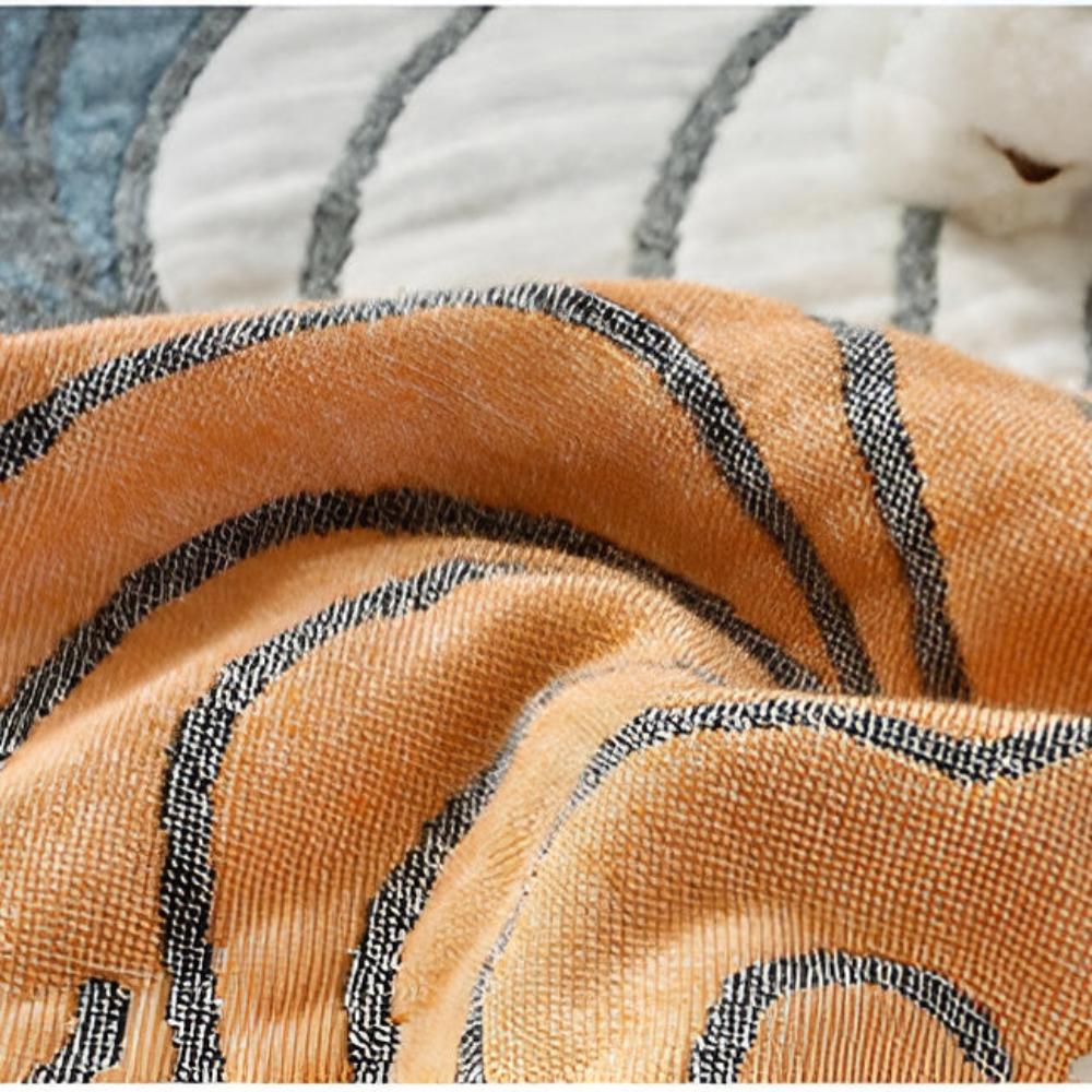 Scallop-Pattern Cotton Blanket — product in use