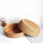 Artisanal Woven Rattan Oval Tray — lifestyle shot
