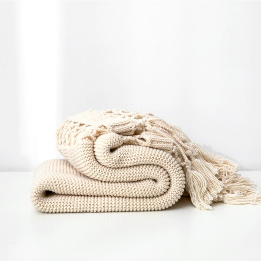 Snug Knit Woven Tassel Blanket — product detail view