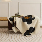 Aurora Bloom | Floral Knitted Blanket — product in use