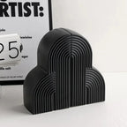 Persephone Cloud-Shaped Ceramic Bookends — product in use