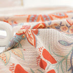Vineyard Blossom Reversible Cotton Blanket — product in use