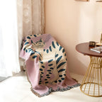 Artful She Tiger Throw Blanket — product in use