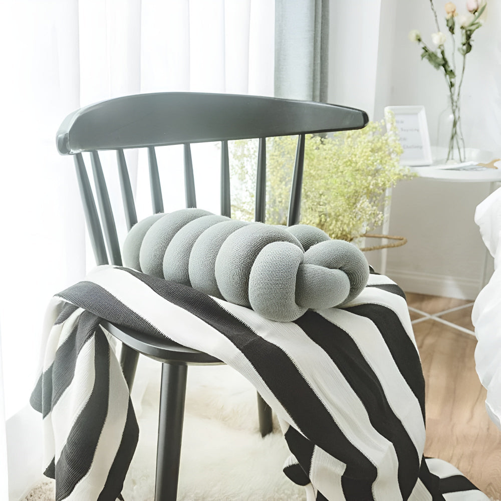 Splendid Ellipse Knotted Plush Cushion — product in use