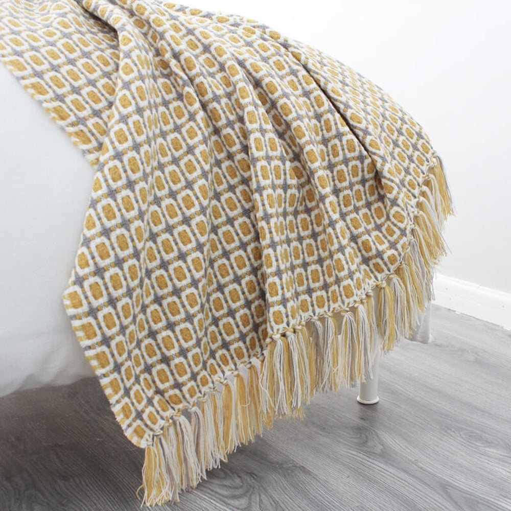 Knitted Couch Blanket with Tassels — product detail view