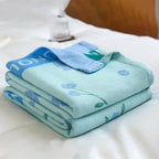 Blue Floral Bamboo Fibre Cooling Blanket — lifestyle shot