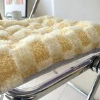 Fuzzy Checkered Fur Padded Cushion — product in use