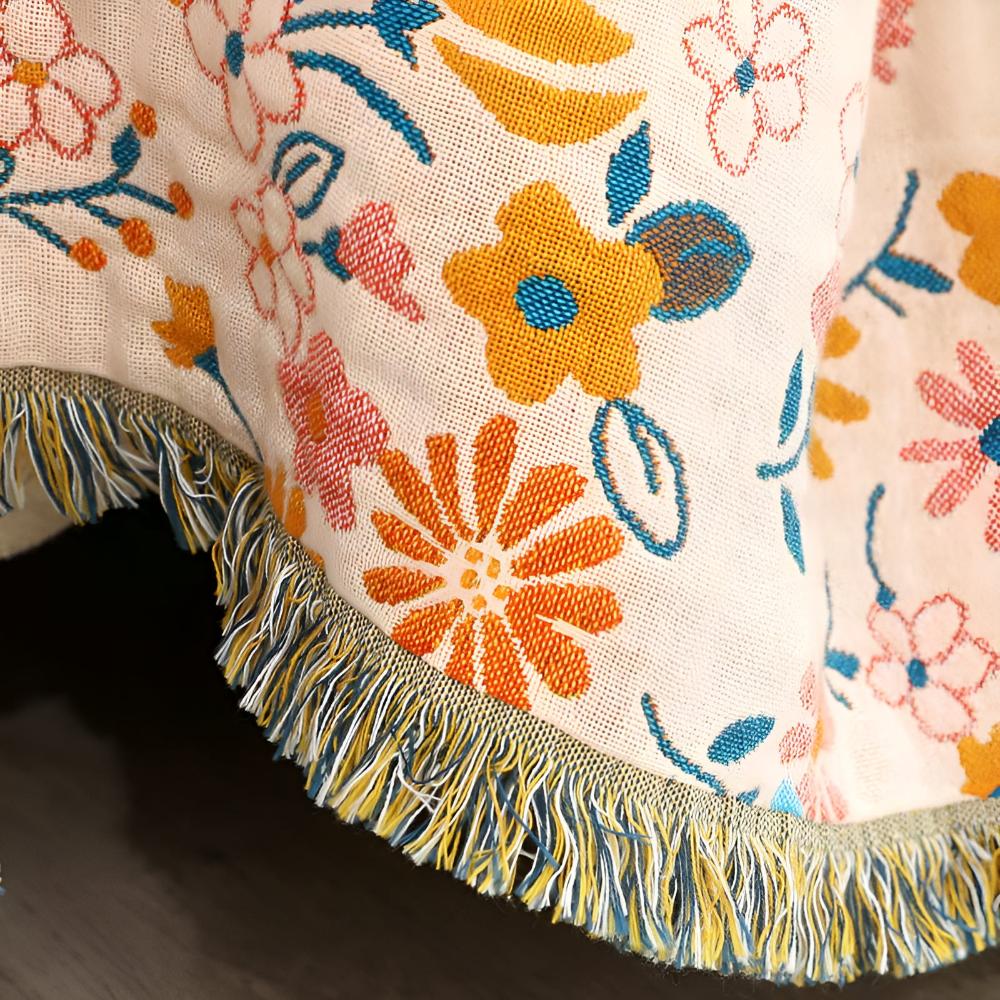 Daisy Dreamer Reversible Tassel Blanket — lifestyle shot