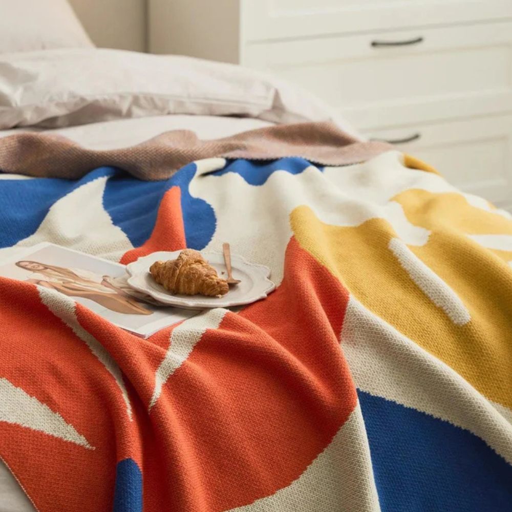 Tropical Breeze Knit Blanket — lifestyle shot