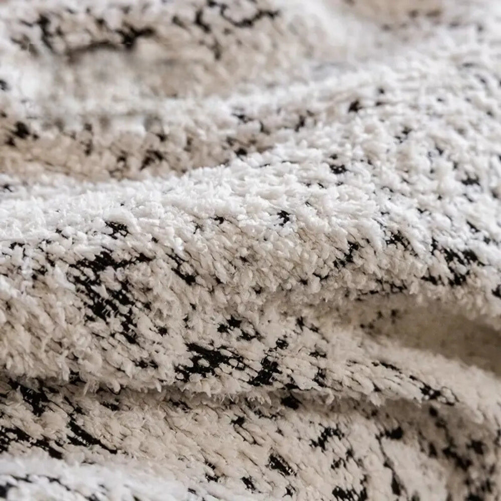 Nordic Speckle Reversible Sofa Cover — product in use