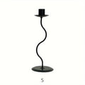 Sculpted Wavy Iron Candle Holder — lifestyle shot