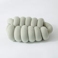 Splendid Ellipse Knotted Plush Cushion — product feature detail