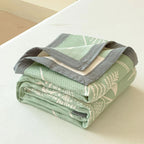 Aurea Reversible Cotton Gauze Blanket — product in use