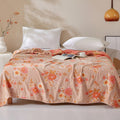 Blush Cotton Gauze Floral Blanket — product close-up