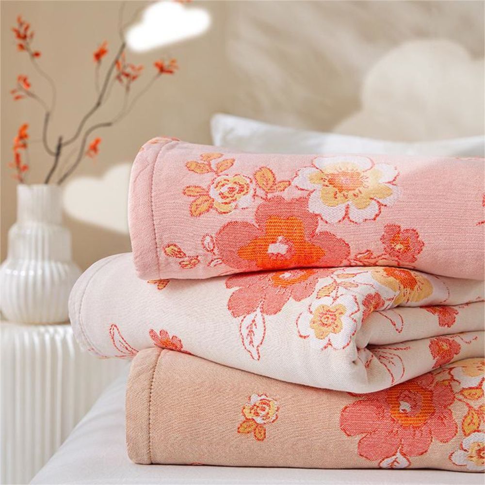 Blush Cotton Gauze Floral Blanket — product detail view