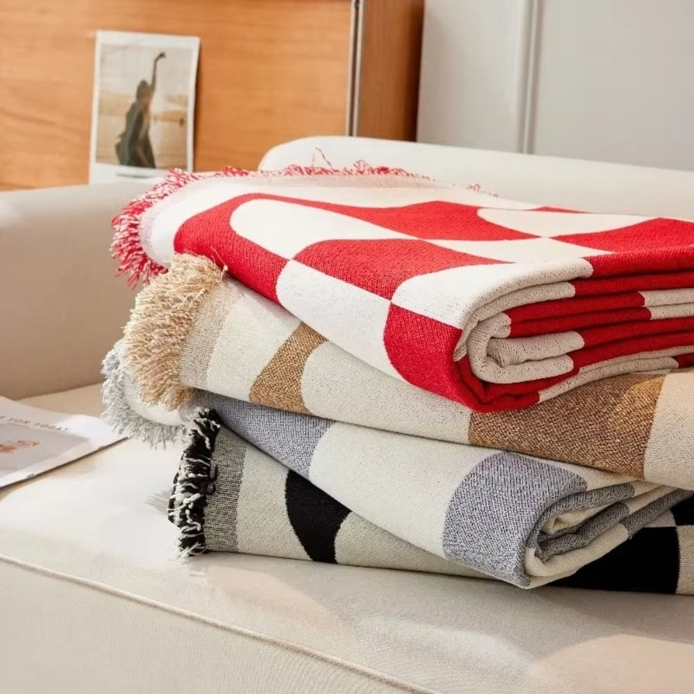 Chess Board Chic Tasseled Sofa Cover — lifestyle shot