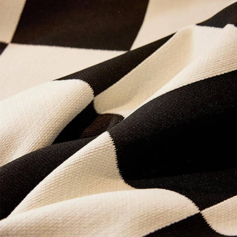 Chess Board Chic Tasseled Sofa Cover — product feature detail