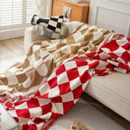 Chess Board Chic Tasseled Sofa Cover — product in use