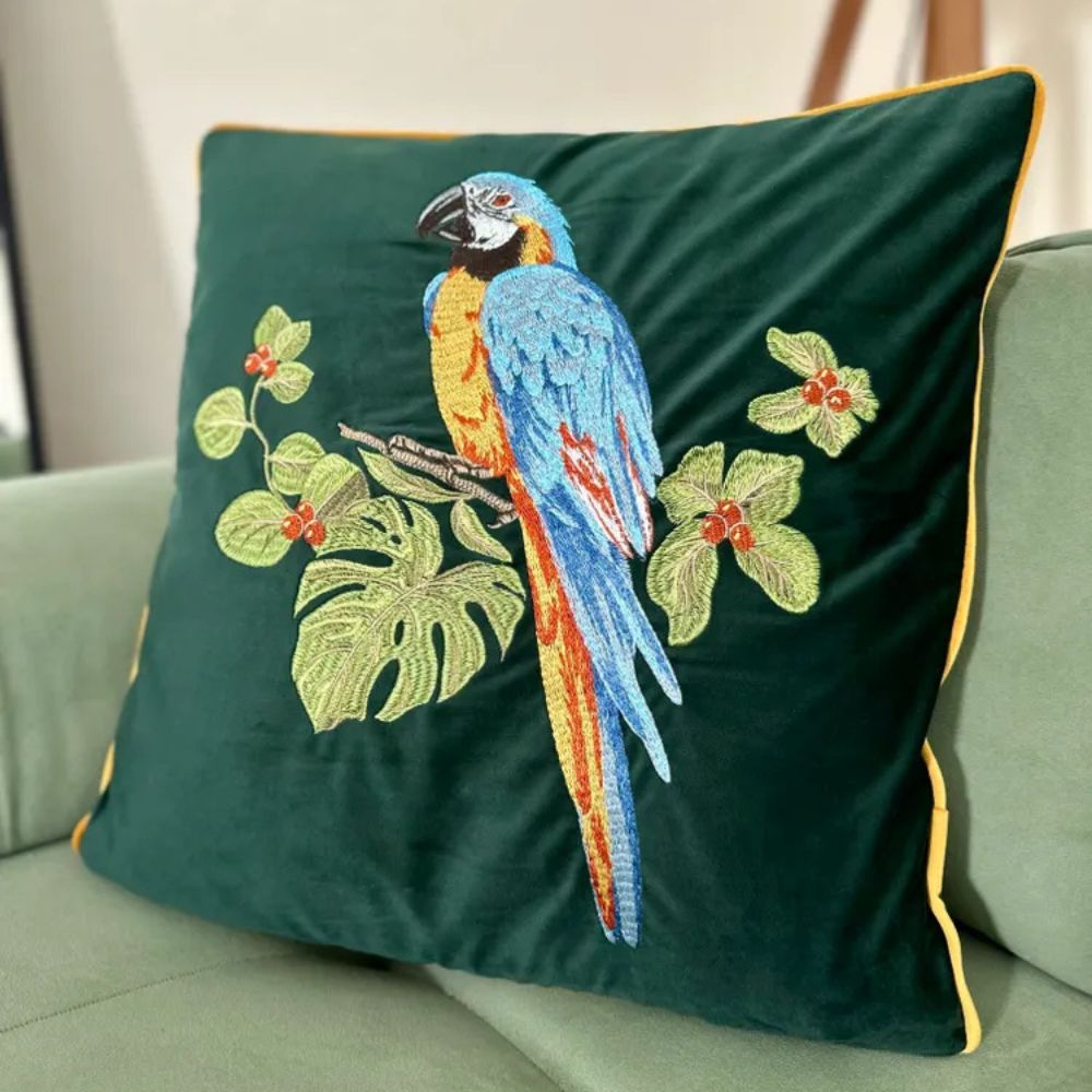 Embroidered Parrot Cushion — product in use