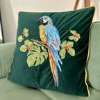 Embroidered Parrot Cushion — product in use
