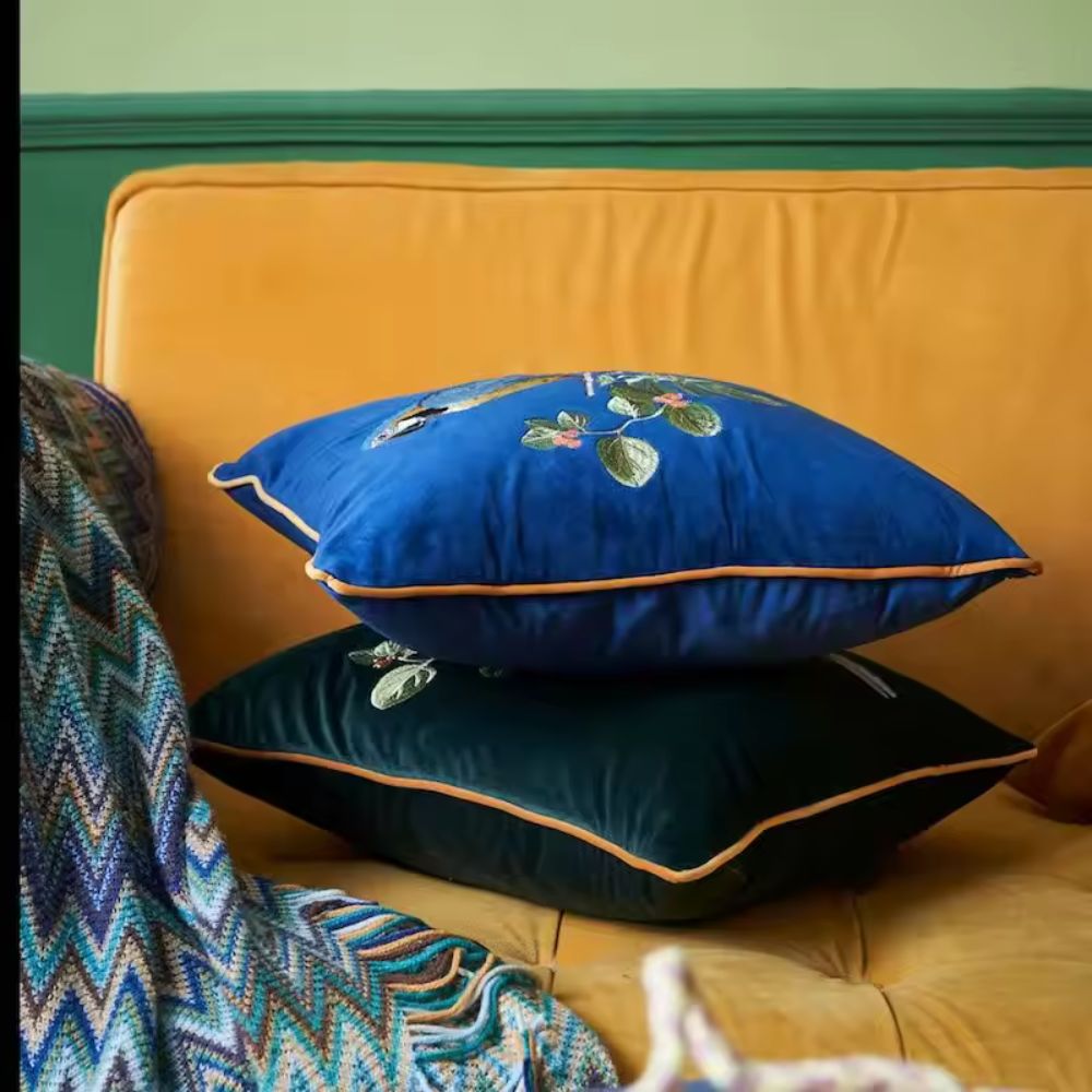 Embroidered Parrot Cushion — lifestyle shot