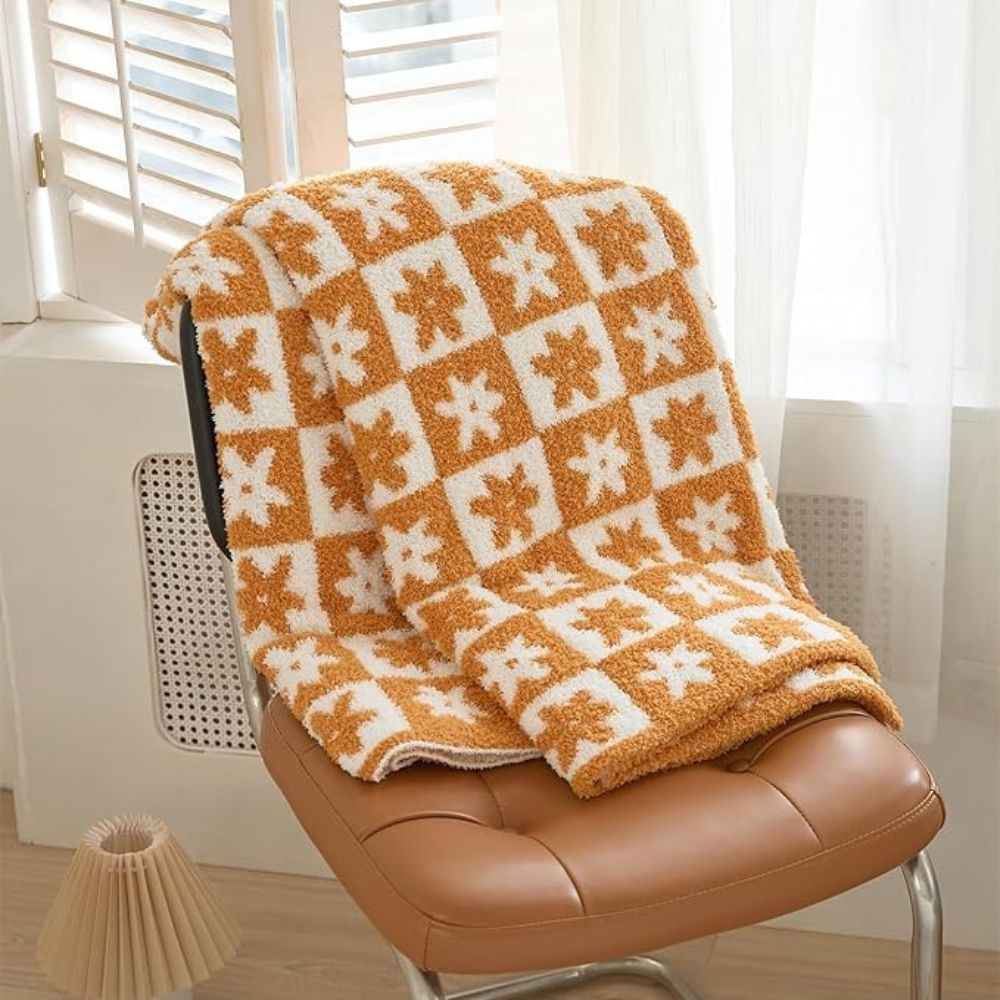 Floriva Checkerboard Daisy Throw Blanket — product in use