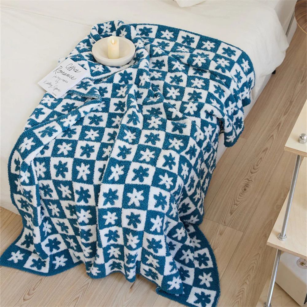 Floriva Checkerboard Daisy Throw Blanket — lifestyle shot