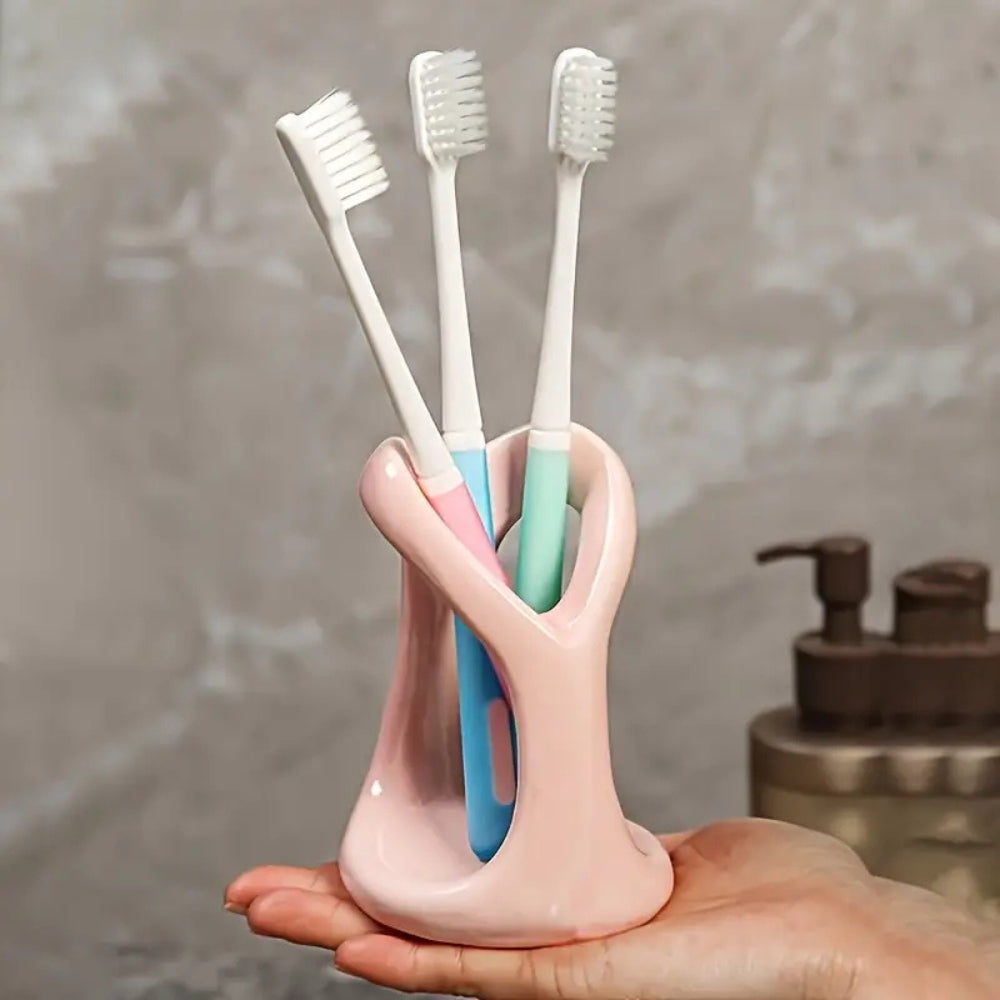 Heart-Shaped Ceramic Toothbrush Holder — product in use