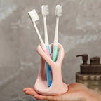 Heart-Shaped Ceramic Toothbrush Holder — product in use