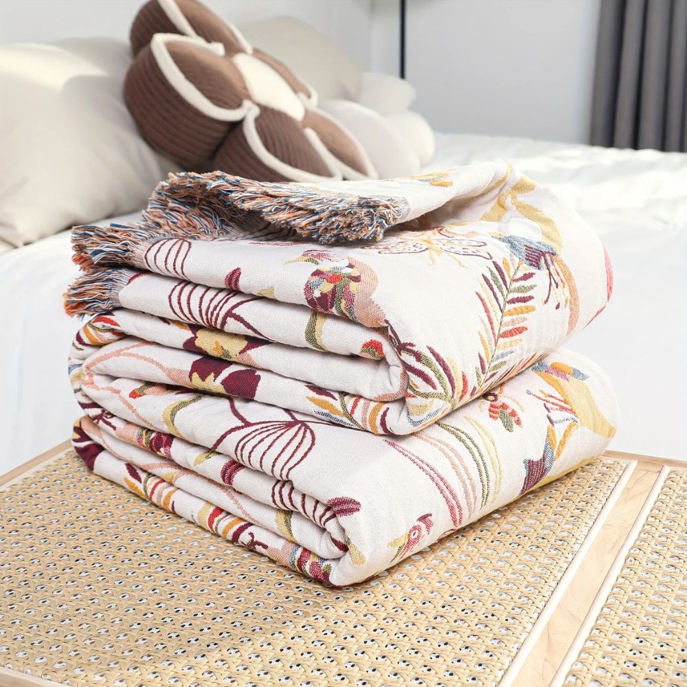 Jungle Bloom Reversible Cotton Blanket — product in use