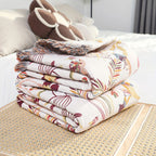 Jungle Bloom Reversible Cotton Blanket — product in use