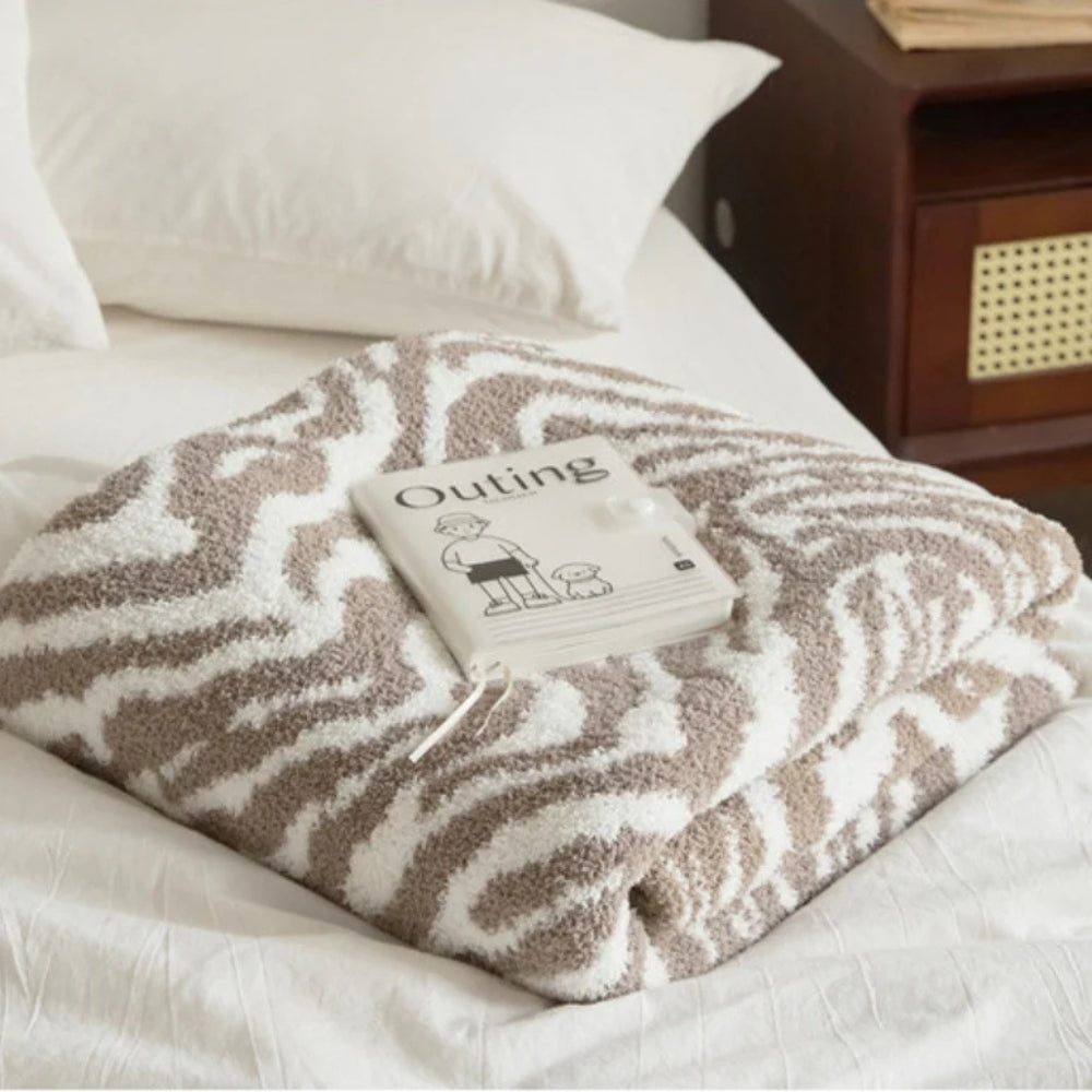Knitted Zebra Pattern Throw Blanket — product in use