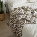 Knitted Zebra Pattern Throw Blanket — lifestyle shot