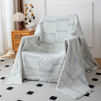 Mixed Tone Geometric Cotton Blanket — product in use