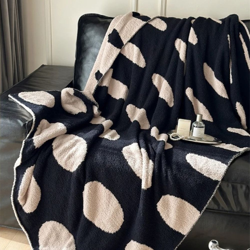 Modern Polka Dot Fleece Blanket — product in use