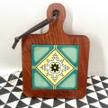 Moroccan Ebony Floral Wooden Trivets — material texture close-up