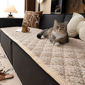 Pet-Proof Textured Quilted Sofa Protector Slipcover — lifestyle shot