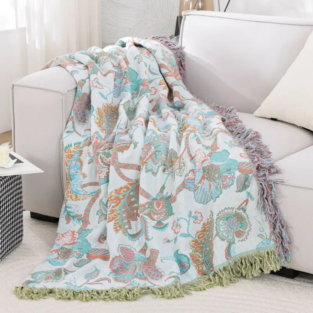 Reverie Floral Tassel Cotton Blanket — product in use